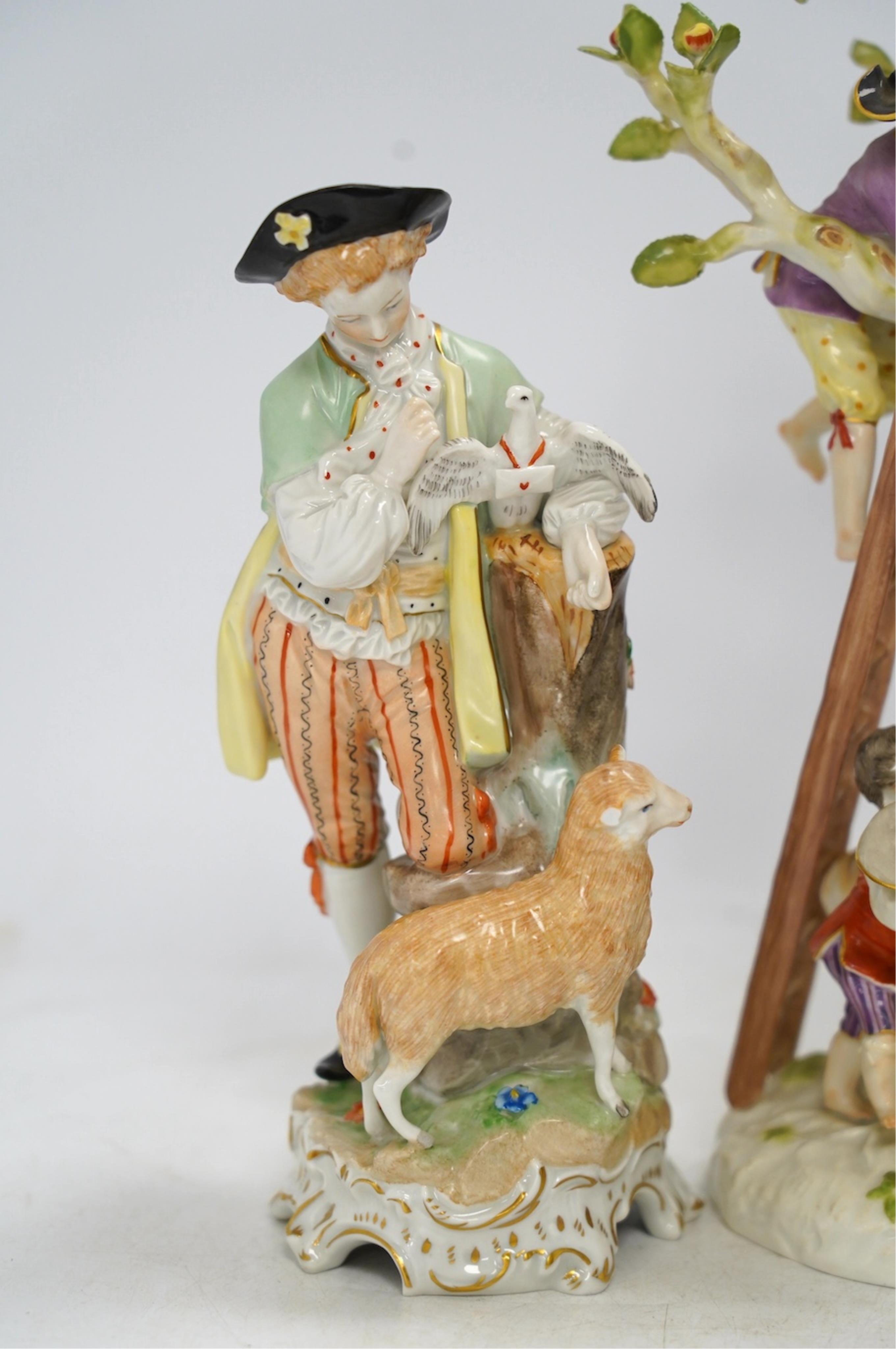 A Meissen apple pickers figure group and a pair of Dresden porcelain groups, tallest 29cm. Condition - some damage